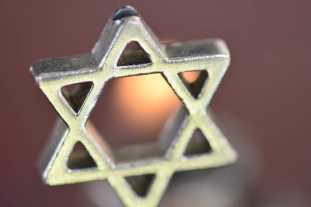istock Star of David on a candle background 1089444856