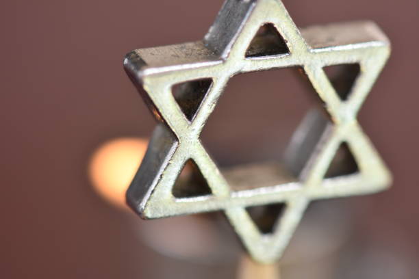 istock Star of David on a candle background 1089444924