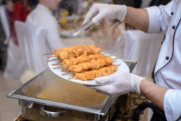 istock The cook puts hot kebabs from chicken meat in a bowl 1089445138