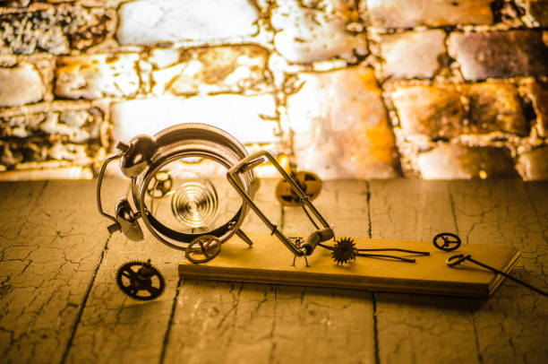 istock Mousetrap, a mechanical watch is broken, a trap for time. 1089452562