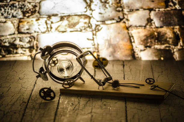 istock Mousetrap, a mechanical watch is broken, a trap for time. 1089452564