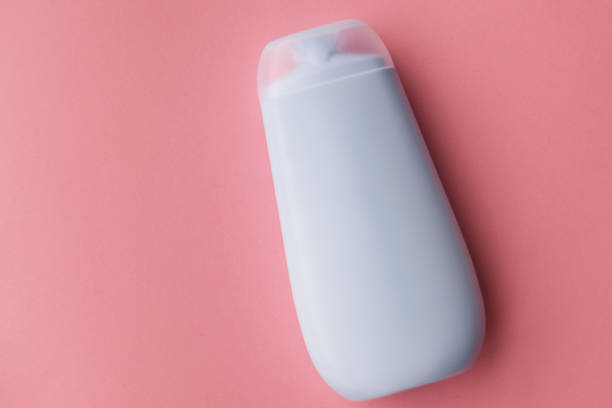 istock Bottle of shower gel on pink background.selective focus 1089453204