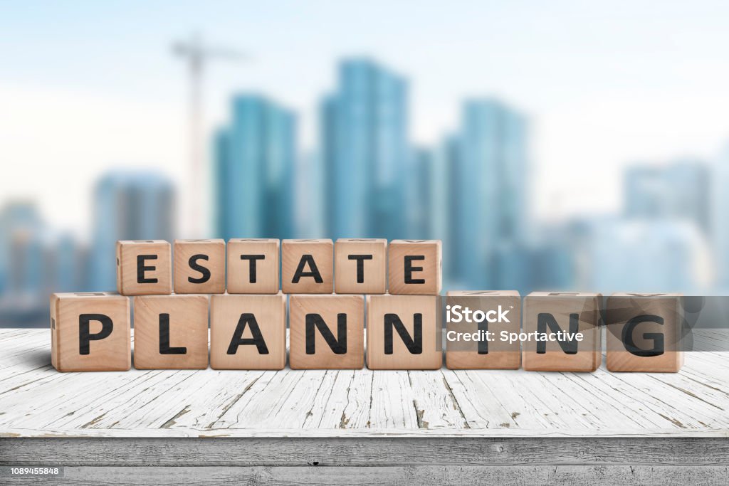 Estate planning sign on a wooden pier Estate planning sign on a wooden pier with tall buildings in the background Will - Legal Document Stock Photo
