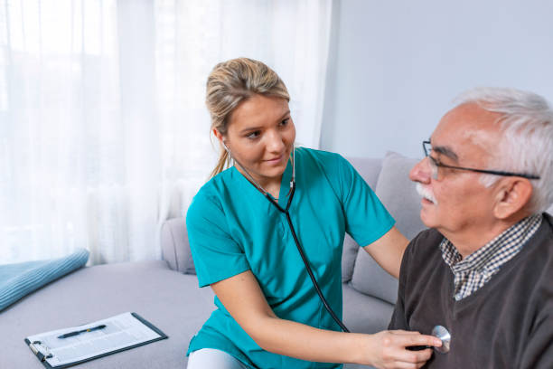 istock Pleasant elderly man having a medical examination 1089456098