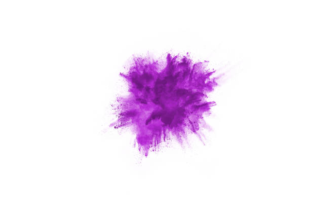 istock Powder explosion. Closeup of a purple dust particle explosion isolated on white. Abstract background. 1089457730