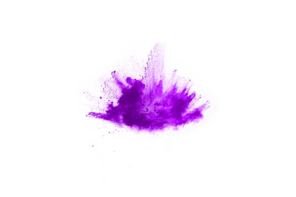 istock Powder explosion. Closeup of a purple dust particle explosion isolated on white. Abstract background. 1089457732