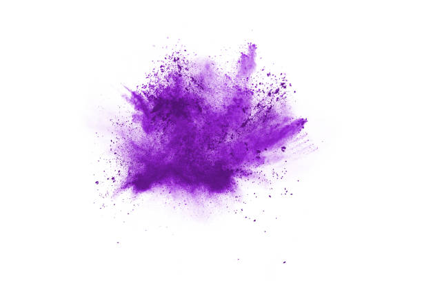 istock Powder explosion. Closeup of a purple dust particle explosion isolated on white. Abstract background. 1089457740