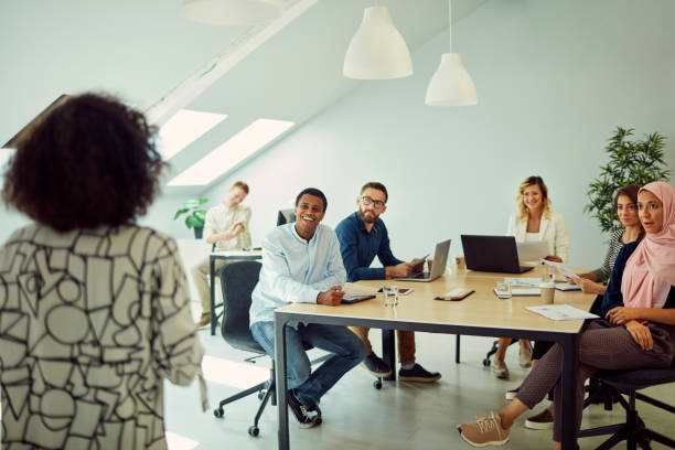 istock African Woman Holding Presentation 1089467250
