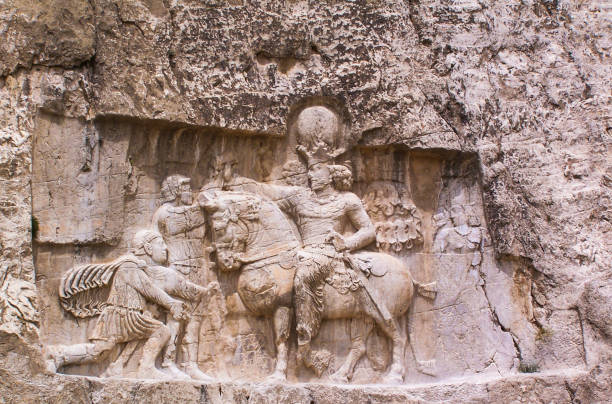 Rock carvings in the necropolis of Naqsh-e Rustam near the ancient ruined city of Persepolis, Iran.