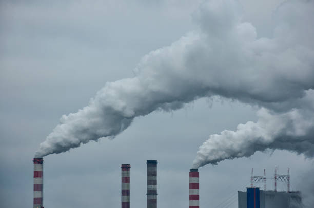 istock Smoke from coal-fired power plant chimneys 1089487602