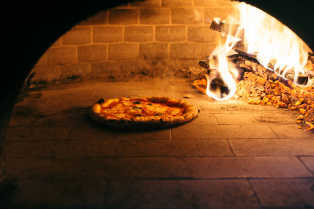 istock Traditional style of a pizza oven with a pizza 1089491146