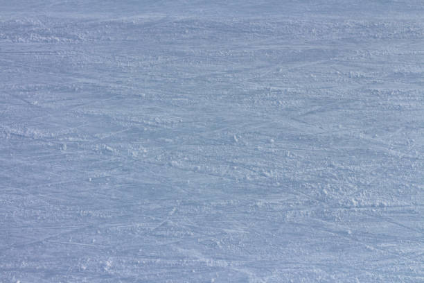 istock Ice surface on a frozen lake with ice skates traces and marks 1089494580