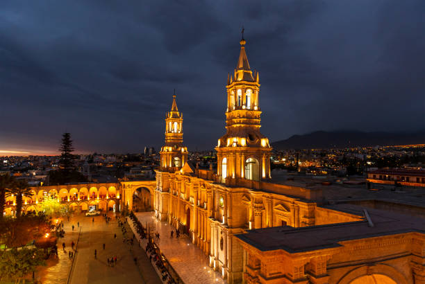 Arequipa at Night, Peru Cityscape of Arequipa after sunset with the illuminated Cathedral and the Plaza de Armas main square, Peru. arequipa province stock pictures, royalty-free photos & images