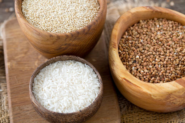 istock rice, quinoa and buckwheat on wooden surface 1089497640