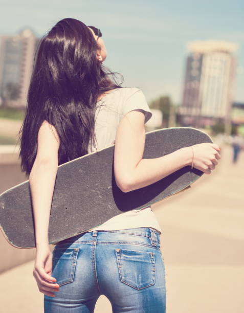 istock Woman skateboard, close up, back, instagram, half height 1089501764