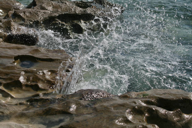 istock Big rocks in the sea water 1089508570
