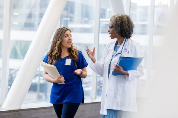 istock Female physicians discuss patient's case 1089509130