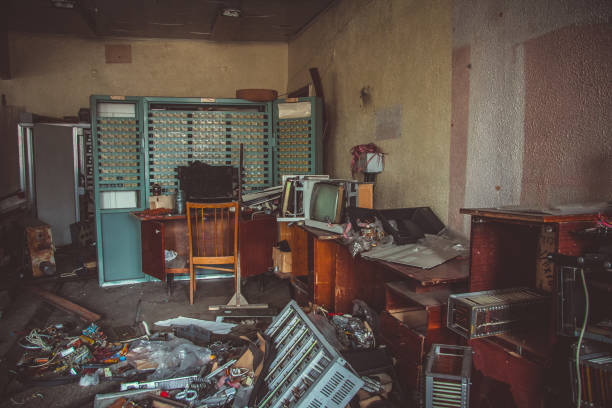 istock Switchgear cabinets with broken hardware in abandoned factory 1089515416