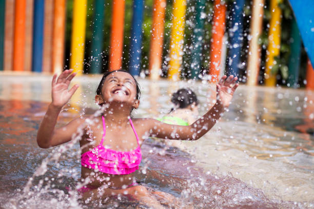 istock Little Girl playing alone in the pool 1089519974