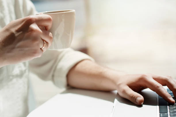 istock Businessman working laptop for new architectural project. Generic design notebook on the table. Young businessman working with laptop at office. Unrecognizable man using a modern portable computer 1089539942