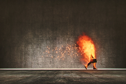Businessman in cloud computing digital flames walking on the street. This is entirely 3D generated image.