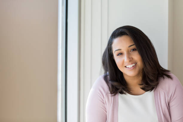 istock Happy Hispanic Woman Smiling 1089552626