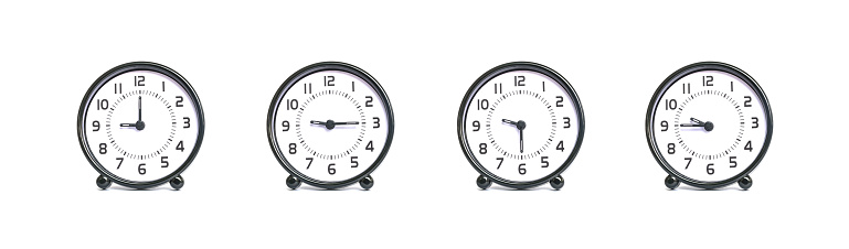 Closeup group of black and white clock show the time in 9 , 9:15 , 9:30 , 9:45 a.m. isolated on white background