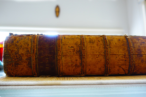 Leather bound spine of an old book published in the 1600's