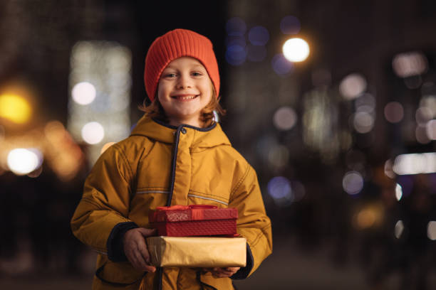 Smiling boy with gifts