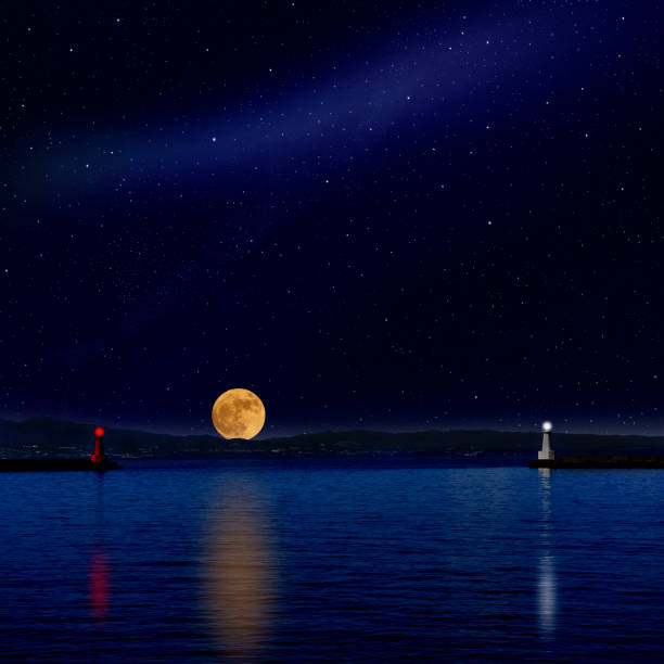 istock Full moon rising over the sea and the lighthouse. 1089599588