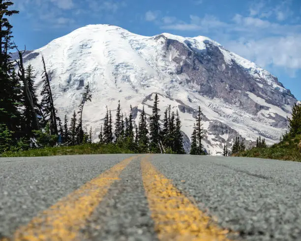 Photo of Abstract Low Road Angle of Mt Rainier with Light Blue Sky