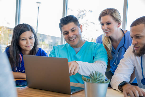 istock Diverse medical students studying together while working in hospital 1089609350