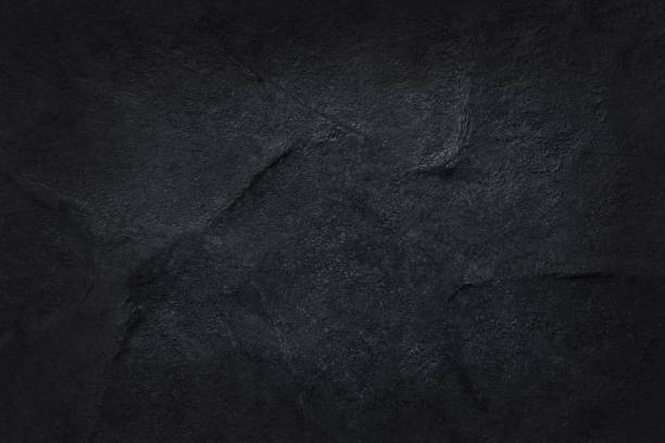 istock Dark grey black slate texture in natural pattern with high resolution for background and design art work. Black stone wall. 1089611094