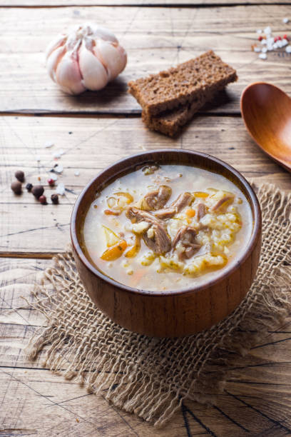 istock Kharcho soup with meat and rice on wooden table 1089617308