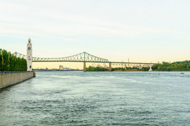 istock Saint Lawrence River, clock tower, and  Jacques Cartier Bridge, Montreal 1089621588