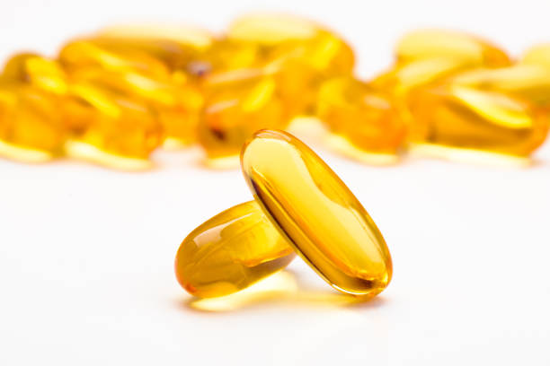 istock Two capsules Omega 3 and many other of capsules 1089629788