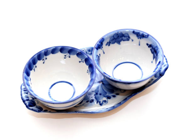 istock Two bowls in Gzhel style on a white background 1089637818