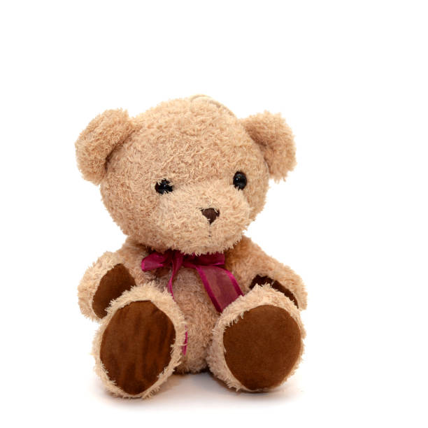istock Teddy bear with a red bow on her neck on an isolated background 1089639800