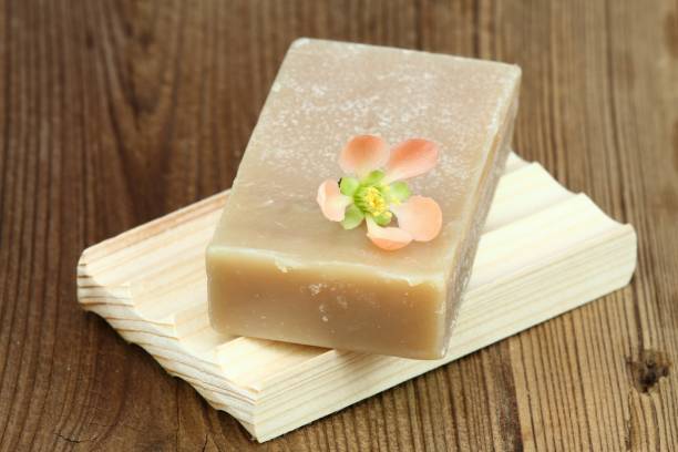 istock Handmade bar of soap on wooden board 1089641790