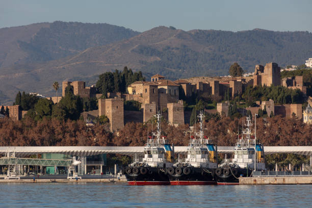 City of Malaga seen from the port Collection of images of the city of Malaga, Spain, taken from the sea, in the port, with views of the old city, the Arab citadel and the cathedral. alcazaba of málaga stock pictures, royalty-free photos & images