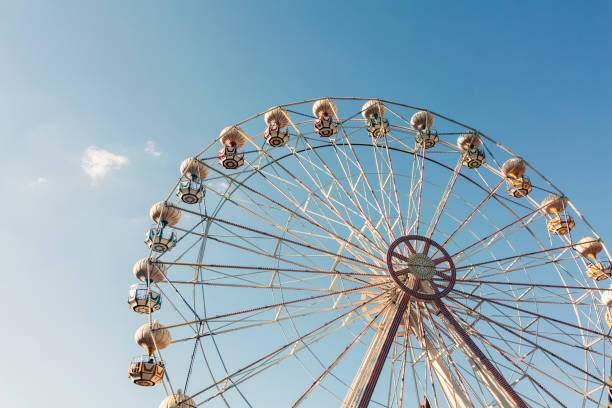 istock Ferris wheel in amusement park 1089648232