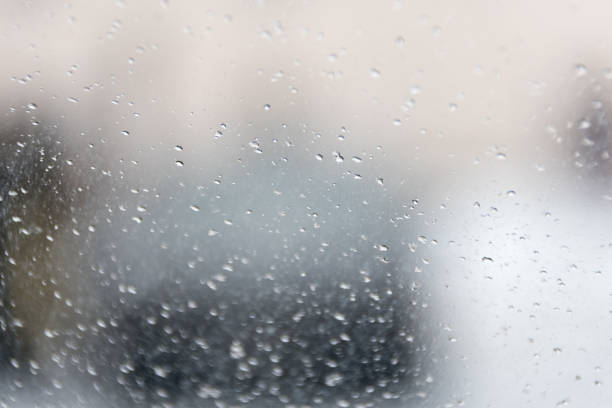 istock Drops on glass, a view from within of the city 1089650184