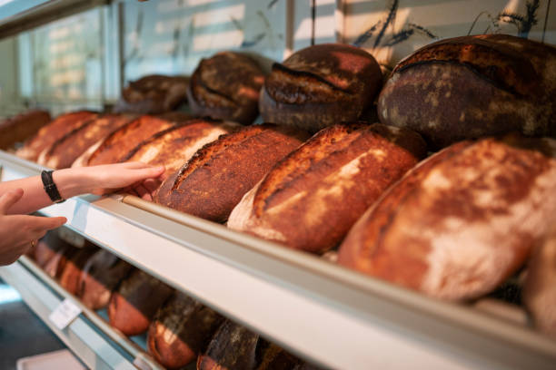 istock Sourdough breads on a shelf in a bakery, Germany 1089654664