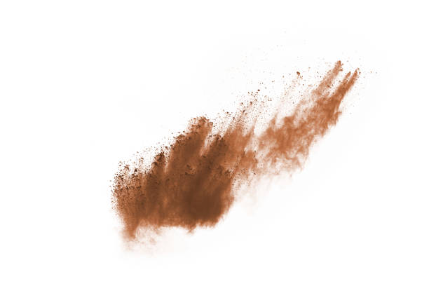 istock Brown color powder explosion on white background. Colored cloud. Colorful dust explode. Paint Holi. 1089655752