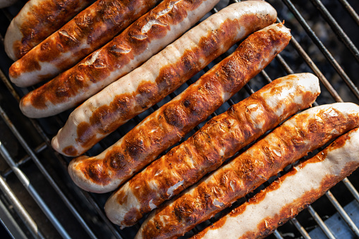 Germany: Fried sausages on a grill.