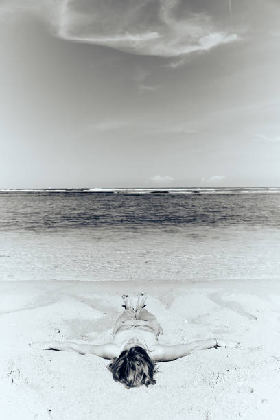istock Slim woman enjoying on a sandy tropical beach. 1089663940