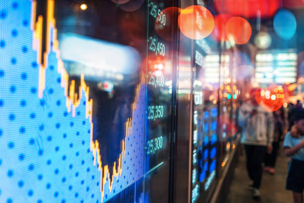 financial stock exchange market display screen board on the street - hong kong city urban scene building exterior imagens e fotografias de stock