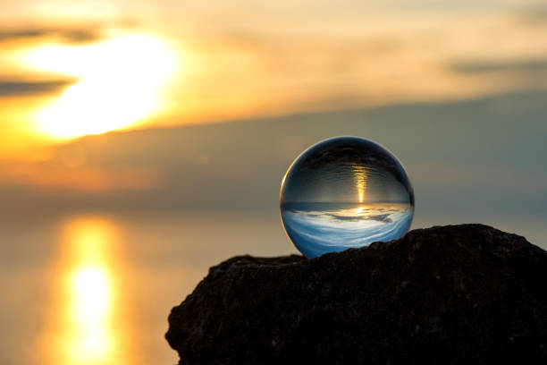 istock Upside down sunset landscape at Cape Kaliakra, Bulgaria, Eastern Europe - reflection in a lensball - selective focus, space for text 1089673790