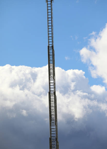 istock Fire truck ladder leading to the sky 1089673892