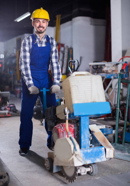 istock Male 30-35 years old is using gas saw for construction work 1089674230